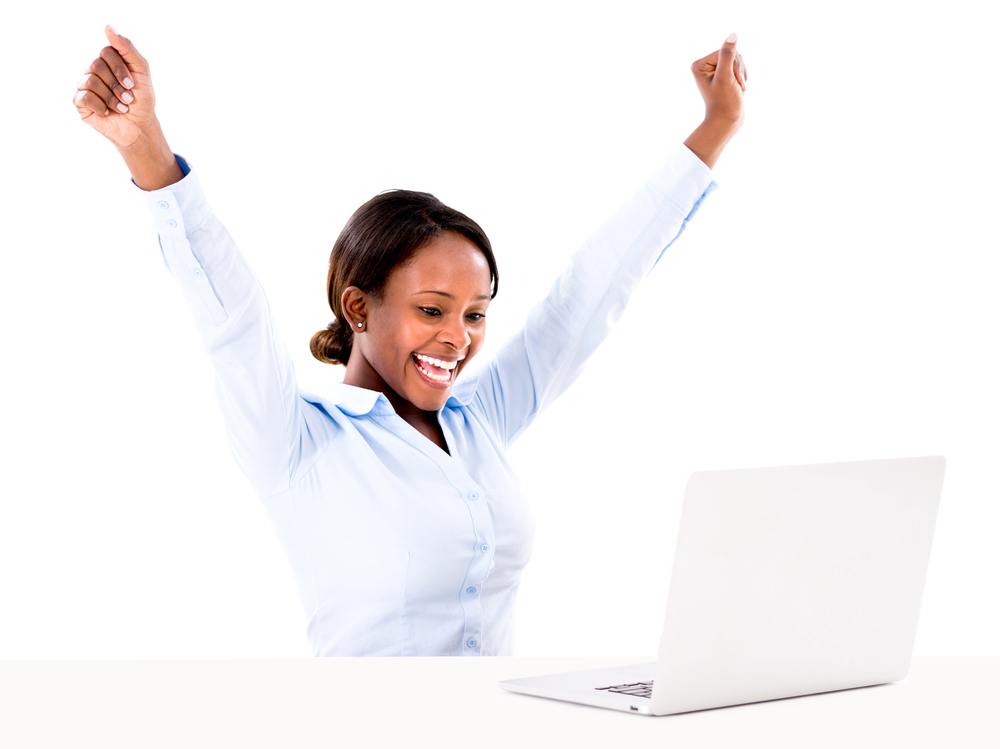 Business woman celebrating her online success - isolated over white